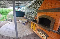 Зона отдыха коттеджа с сауной На Гало